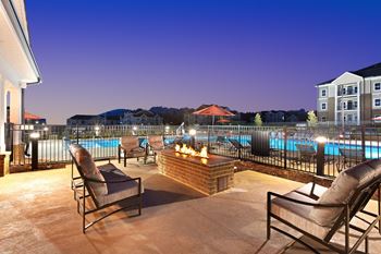 Chill With Your Friends At Outdoor Fire-pit at Abberly Avera Apartment Homes by HHHunt, Virginia, 20109